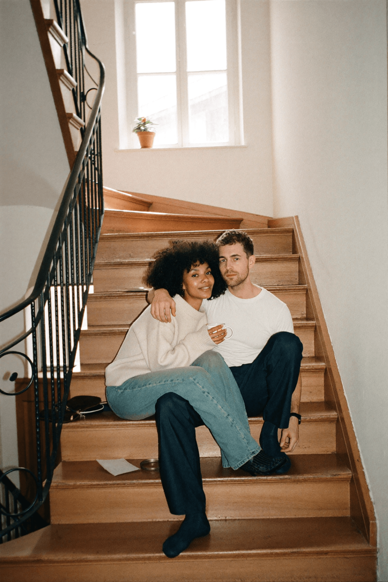 Young couple relaxing at home — expats in Germany