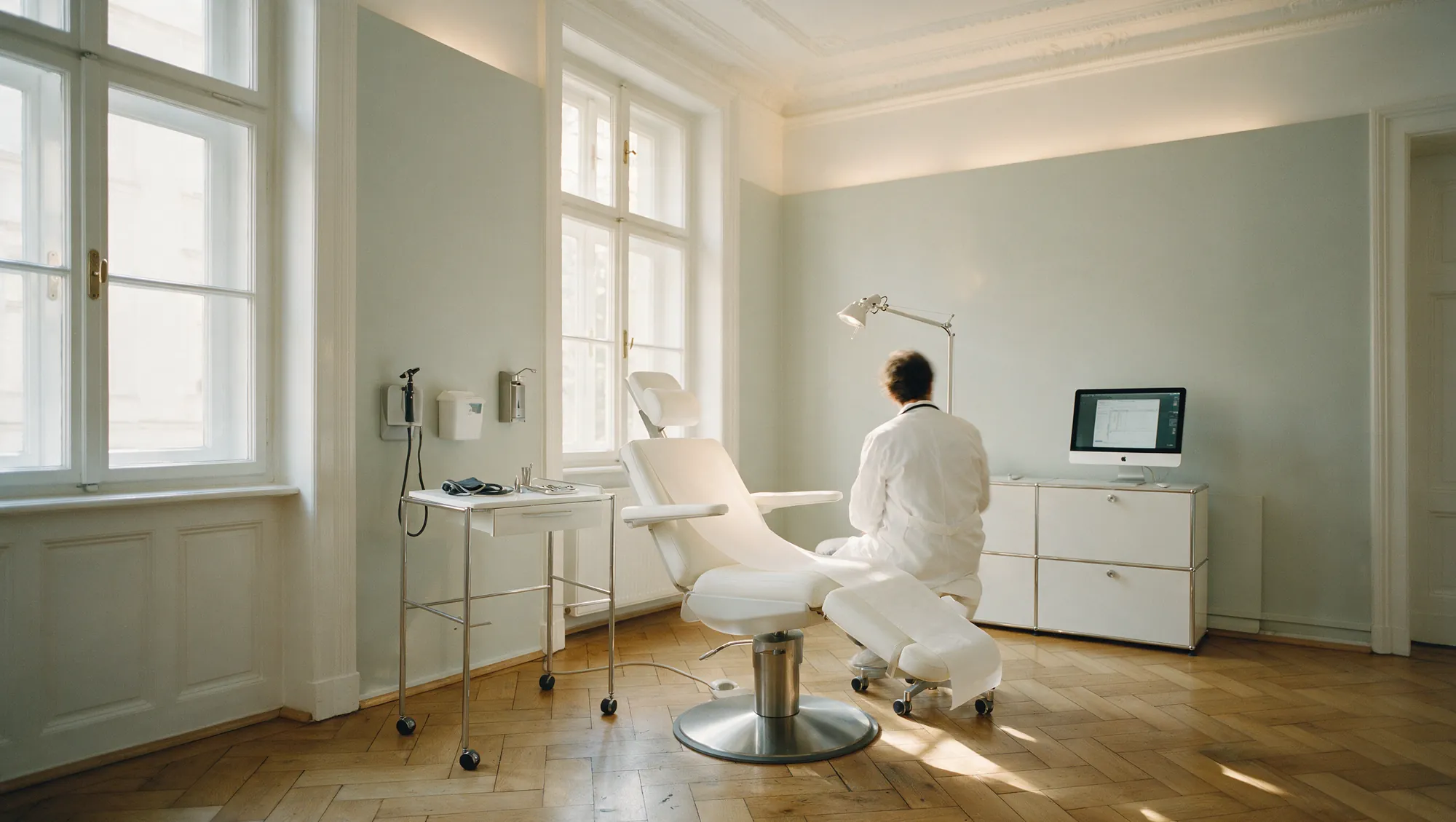 A doctor at work in a bright specialist practice